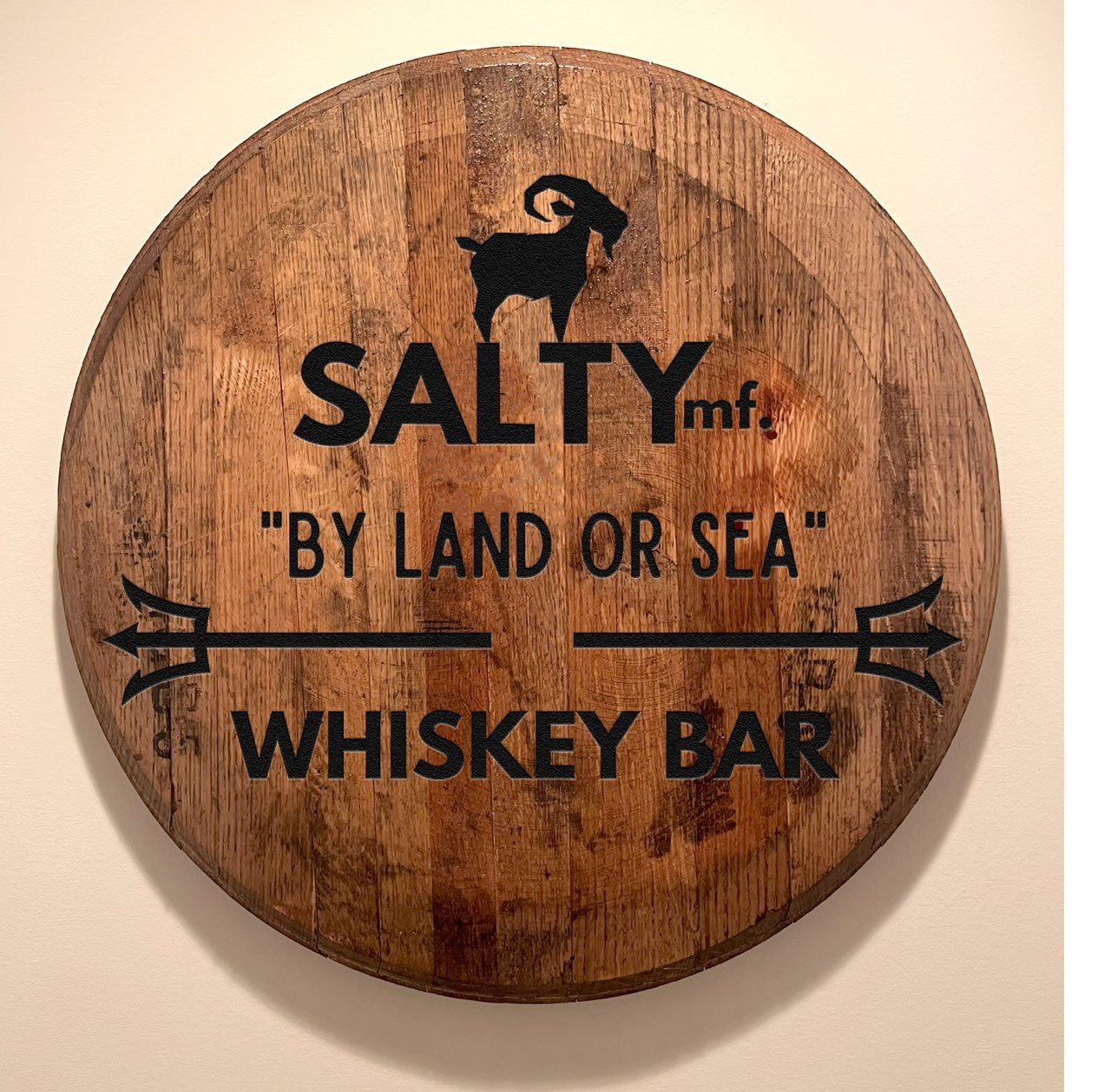The SaltyMF Authentic Land or Sea Bar Barrel Head.
